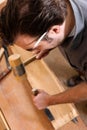 Carpenter with chisel and hammer Royalty Free Stock Photo