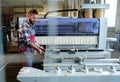 Carpenter doing his job in carpentry workshop Royalty Free Stock Photo