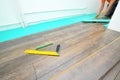 Carpenter doing laminate floor work Royalty Free Stock Photo