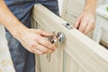 Carpenter at door lock installation Royalty Free Stock Photo