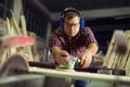 Carpenter with an electric router Royalty Free Stock Photo