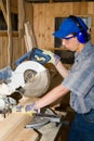 Carpenter & electric saw Royalty Free Stock Photo