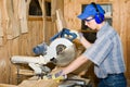 Carpenter & electric saw Royalty Free Stock Photo