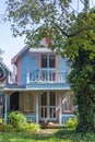 Carpenter Gothic Cottages with Victorian style, gingerbread trim in Wesleyan Grove, town of Oak Bluffs on Martha`s Vineyard, Royalty Free Stock Photo