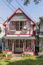 Carpenter Gothic Cottages with Victorian style, gingerbread trim in Wesleyan Grove, town of Oak Bluffs on Martha`s Vineyard, Royalty Free Stock Photo