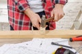 Carpenter hammer a nail