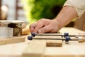 Carpenter hands at work with clamp Royalty Free Stock Photo