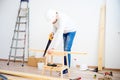 Carpenter with a handsaw Royalty Free Stock Photo