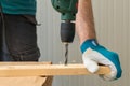 Carpenter handyman using electric drill Royalty Free Stock Photo
