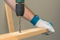 Carpenter handyman using electric drill Royalty Free Stock Photo