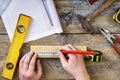 Carpenter with his tools wotking in workshop Royalty Free Stock Photo