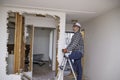 Carpenter in home during demolition