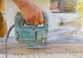 Carpenter or joiner working with electric saw - closeup on hands,Carpenter on nature,Carpenter in thailand,Carpenter in asia Royalty Free Stock Photo