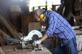 Carpenter, joiner is working in the workshop. Royalty Free Stock Photo