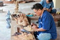 Carpenter makes wooden Handicraft