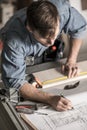 Carpenter making furniture