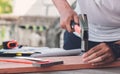 Carpenter man hammering a nail Royalty Free Stock Photo