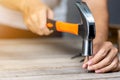 Carpenter man hammering a nail Royalty Free Stock Photo