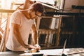 Carpenter man woodcraft working in furniture wood workshop with professional skill real people workman Royalty Free Stock Photo