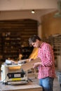 Carpenter measures the board thickness of the callipers, joiner'