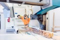 Carpenter man and woman working in workshop Royalty Free Stock Photo