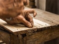 Carpenter nailing in a wooden surface stock footage.