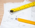 Carpenter pencil and rule on plans Royalty Free Stock Photo