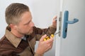 Carpenter Repairing Door Lock Royalty Free Stock Photo