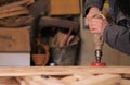 Carpenter`s hands with tools at woodworking
