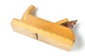 Carpenter`s tool old wooden plane on a white background. Royalty Free Stock Photo