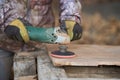 Carpenter sanding walnut wood