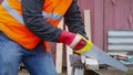 Carpenter with saw