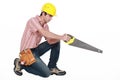 Carpenter with a saw Royalty Free Stock Photo