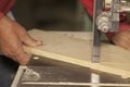 Carpenter sawing