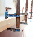 Carpenter clamp tool pressing wood slats