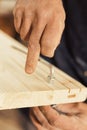Carpenter screws and secures board
