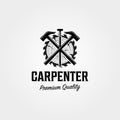 Carpenter shop logo vintage vector symbol illustration design , woodworking hammer and nail steel symbol design Royalty Free Stock Photo