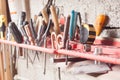 Carpenter tools fixed on the wall at workshop Royalty Free Stock Photo