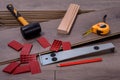 Carpenter tools on laminated flooring