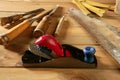 Carpenter tools saw hammer wood tape plane gouge Royalty Free Stock Photo
