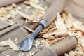 Carpenter tools in wood sawdust on workbench Royalty Free Stock Photo
