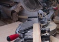 Carpenter tools on wooden table with sawdust. Circular Saw.