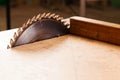 Carpenter tools on wooden table with sawdust. Circular Saw. Cutting a wooden plank