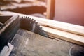 Carpenter tools on wooden table with sawdust. Circular Saw. Royalty Free Stock Photo