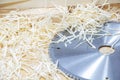 Carpenter tools on wooden table with sawdust. Circular Saw. Carpenter workplace top view. Royalty Free Stock Photo