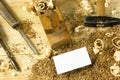 Carpenter tools on wooden table with sawdust. Craftperson workplace top view Royalty Free Stock Photo