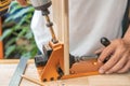 Carpenter use drill bit Pocket hole joinery, or pocket screw joinery, involves drilling a hole at an angle ,make strong joints on Royalty Free Stock Photo