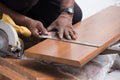 Carpenter use ruler to measuring wood Royalty Free Stock Photo
