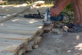 Carpenter using circular saw for cutting wooden boards Royalty Free Stock Photo