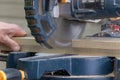 Carpenter using circular saw in DIY project. Royalty Free Stock Photo